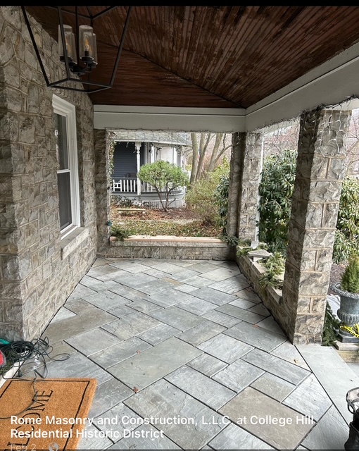 Historic stone porch with bluestone flooring in College Hill district